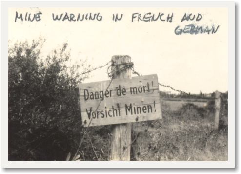 Minefield warning in French and German. (Lou Cerino)